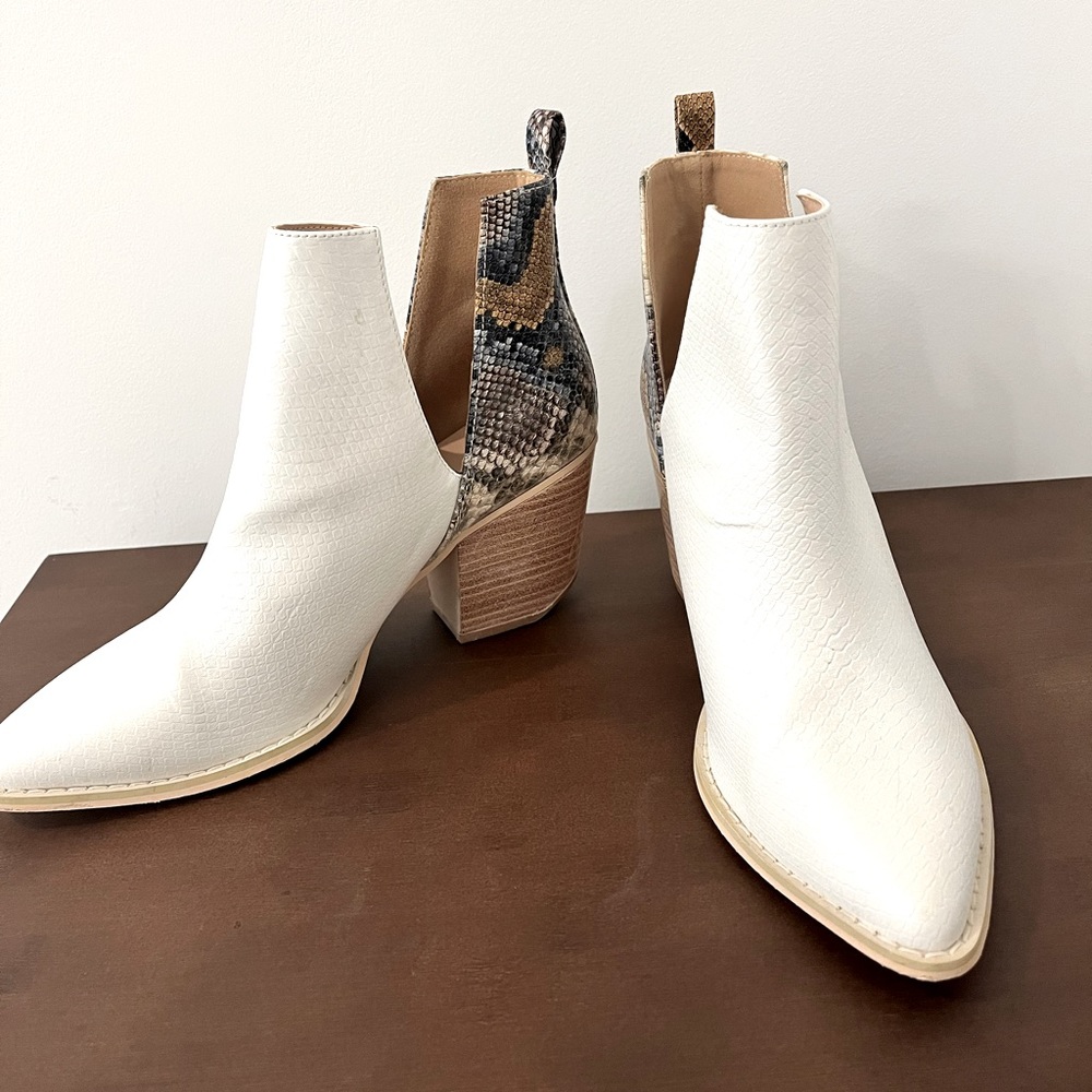 White ankle booties with snake skin accent